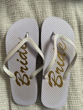 Bruno Gold Script Flip Flops - Light Lavender with Gold Logo